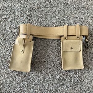 Free people belt. Tool belt look. Size small. Leather suede. Beige color.